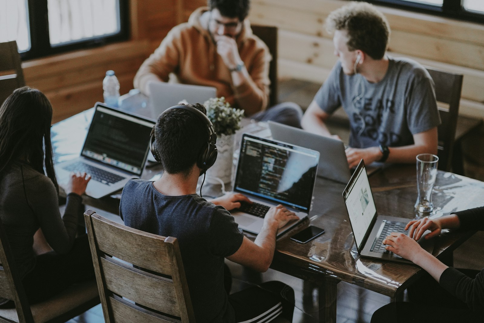 Advisor working through a stack of pages